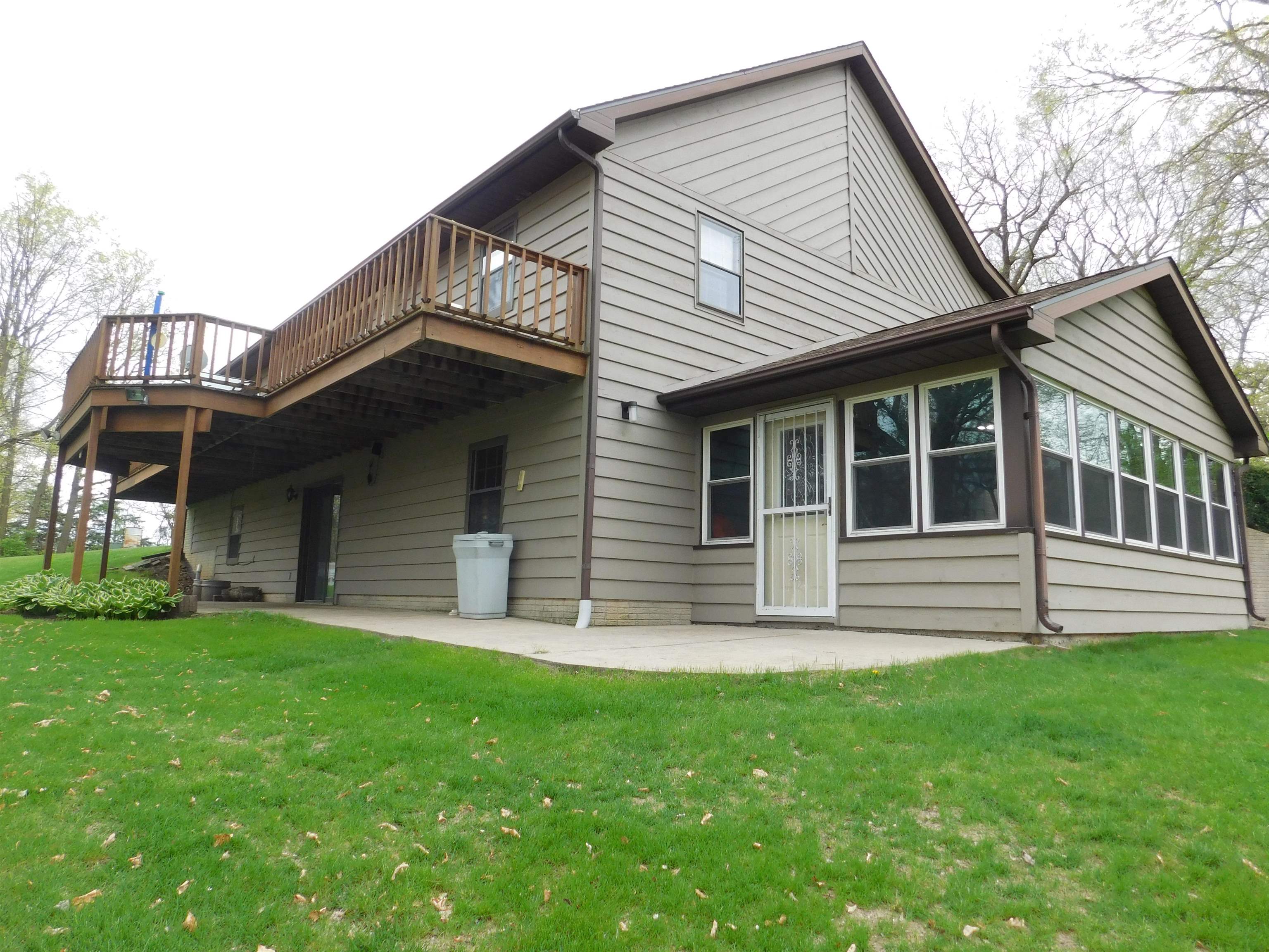 4103 North AYP Road Lena, IL 61048 - Photo 86 of 96 a front view of a house with a garden