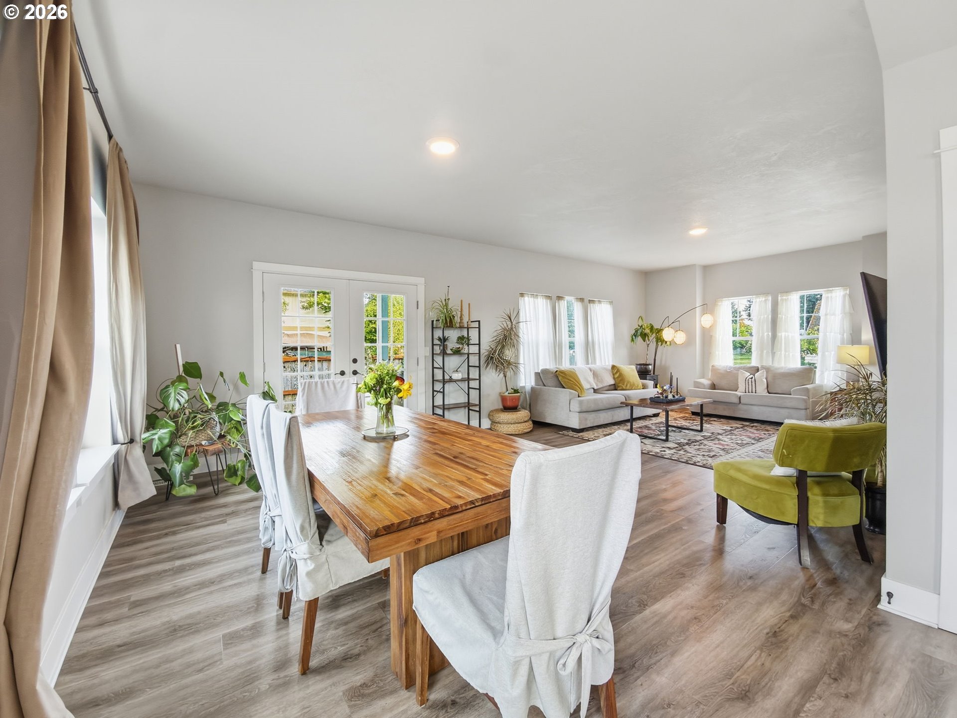 1310 Elm Street Junction City, OR 97448 - Photo 15 of 39 a view of a dining room with furniture window and wooden floor