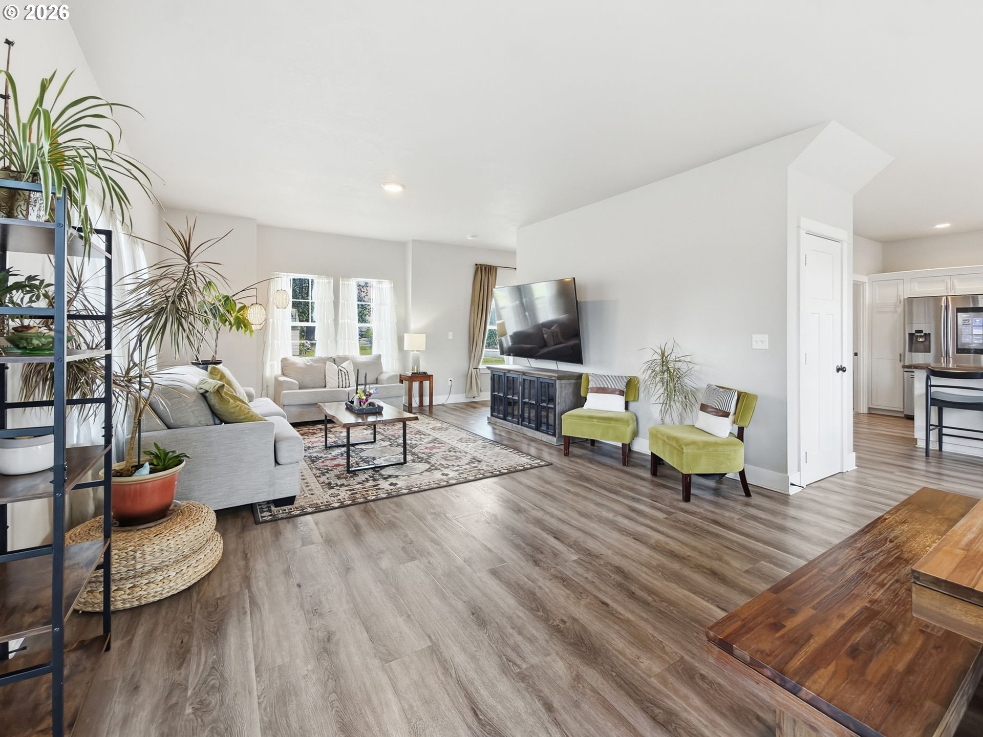 1310 Elm Street Junction City, OR 97448 - Photo 17 of 39 a living room with furniture and a wooden floor