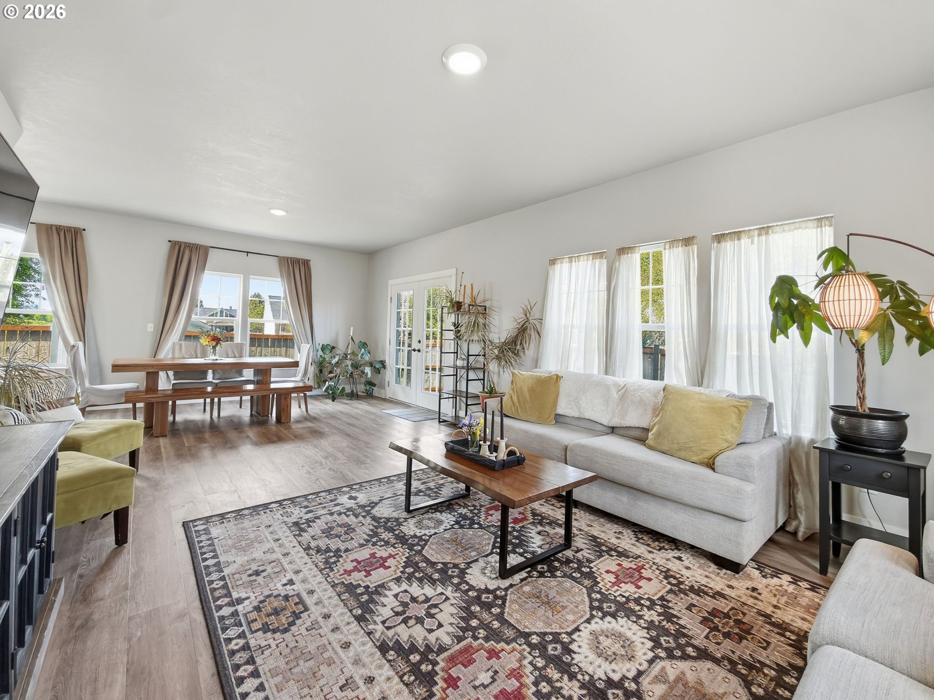 1310 Elm Street Junction City, OR 97448 - Photo 18 of 39 a living room with furniture and a large window