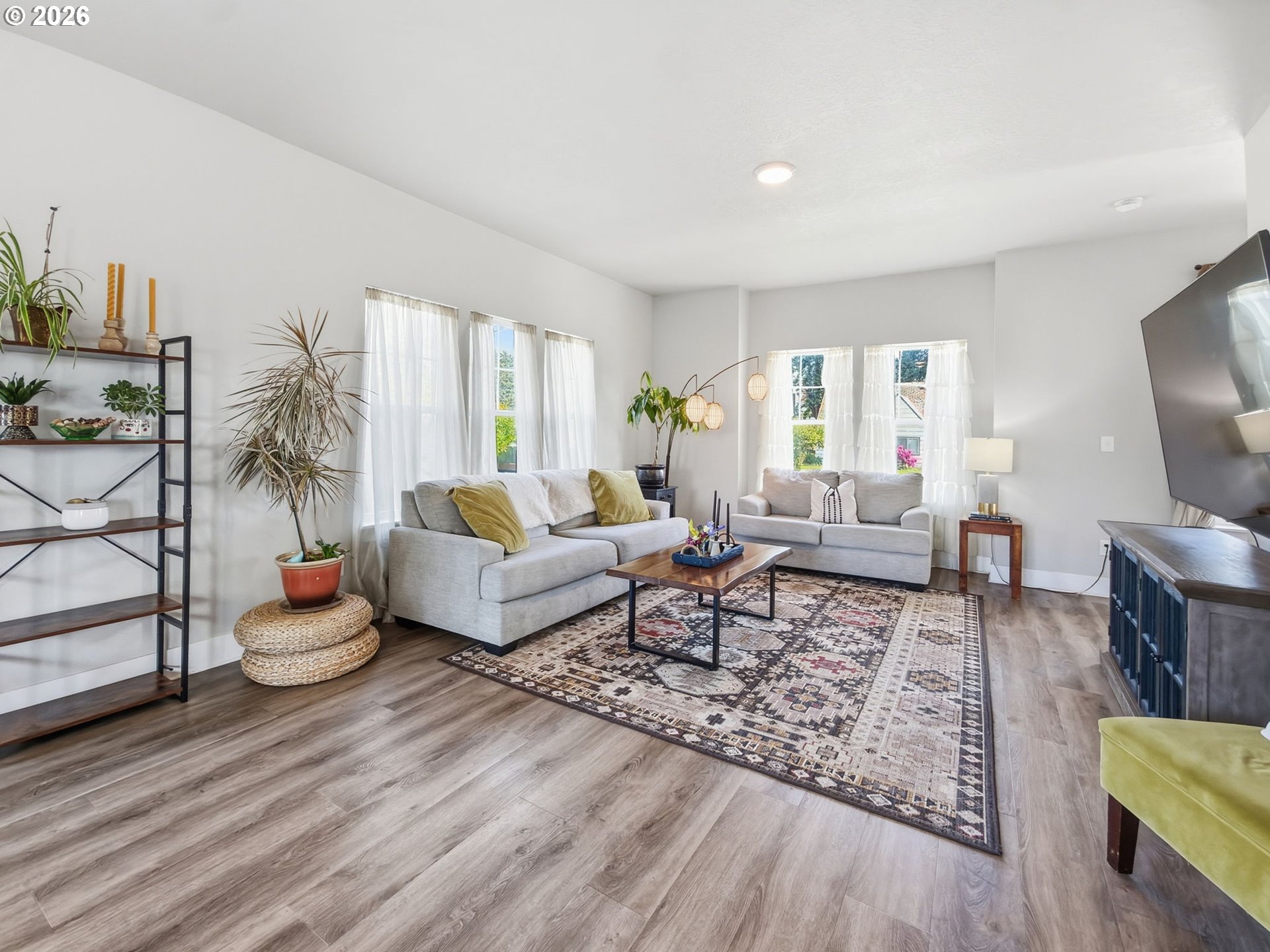 1310 Elm Street Junction City, OR 97448 - Photo 21 of 39 a living room with furniture and a wooden floor