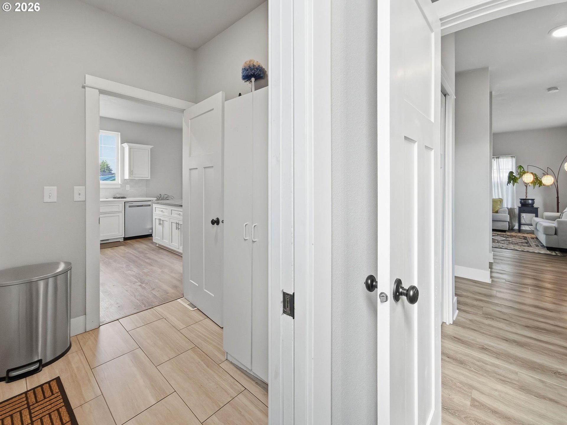 1310 Elm Street Junction City, OR 97448 - Photo 22 of 39 a view of a hallway with bathroom and wooden floor