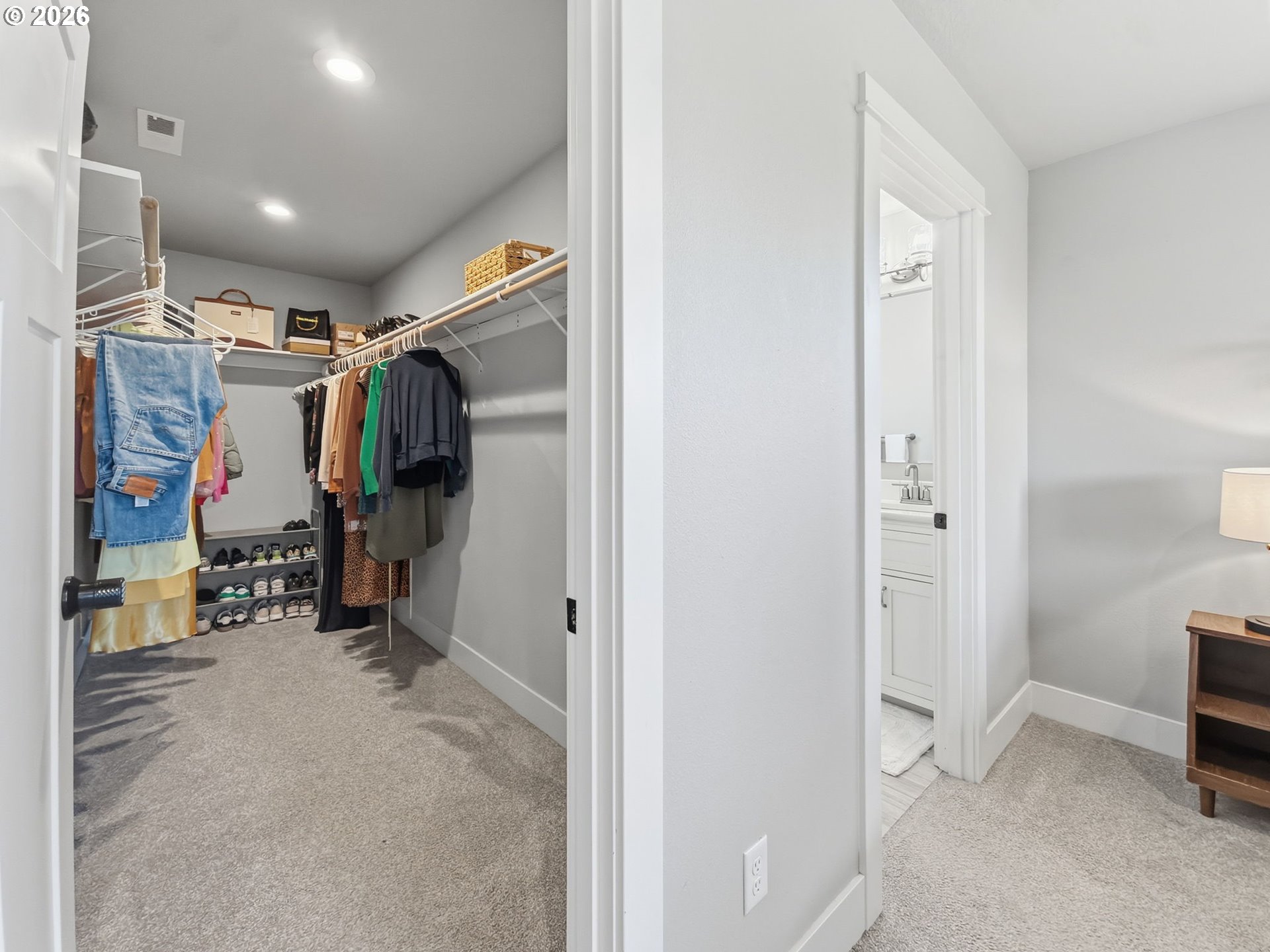 1310 Elm Street Junction City, OR 97448 - Photo 27 of 39 a view of walk in closet with clothes and shoes