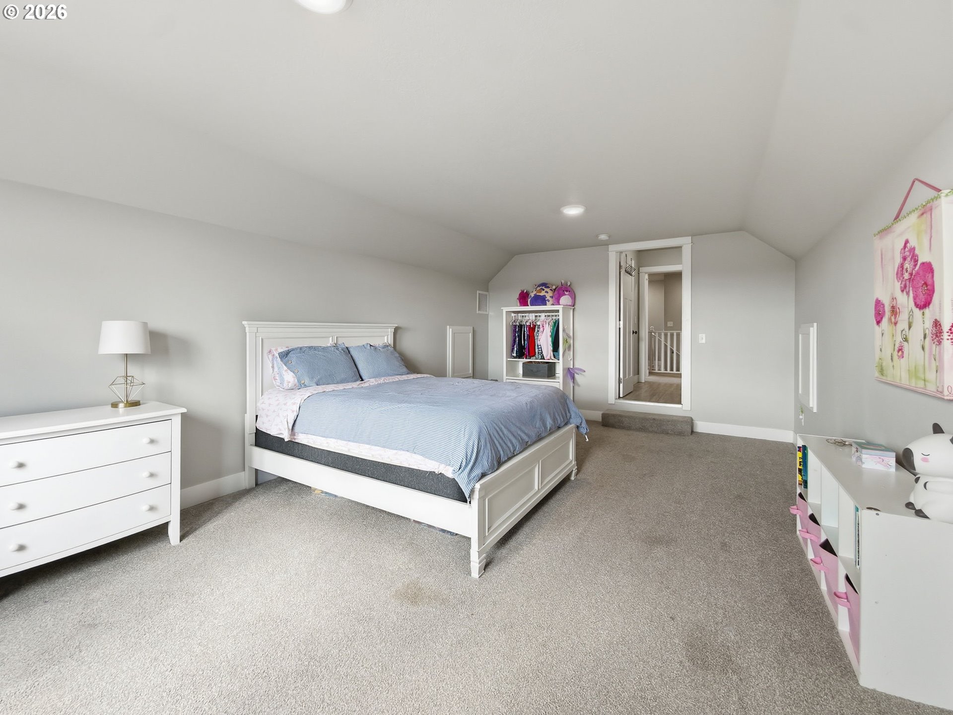 1310 Elm Street Junction City, OR 97448 - Photo 35 of 39 a bedroom with a bed and cabinet