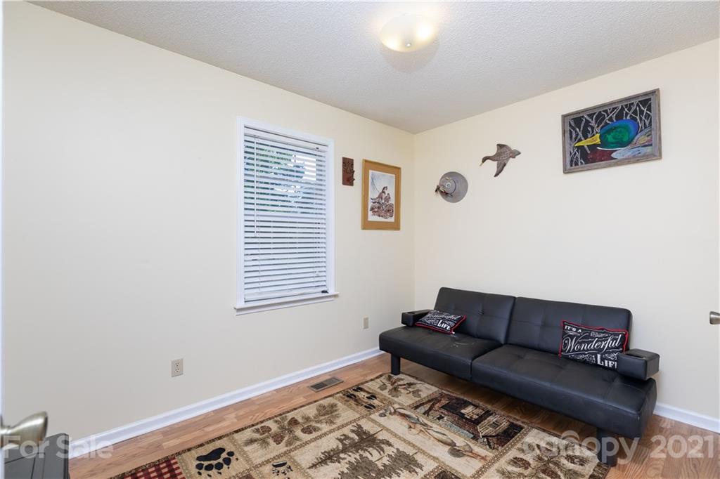 762 State Rd S-46-1086 Clover, SC 29710 - Photo 13 of 34 a living room with a couch and a window