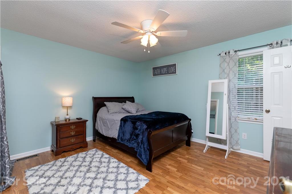 762 State Rd S-46-1086 Clover, SC 29710 - Photo 14 of 34 a bedroom with a bed and window