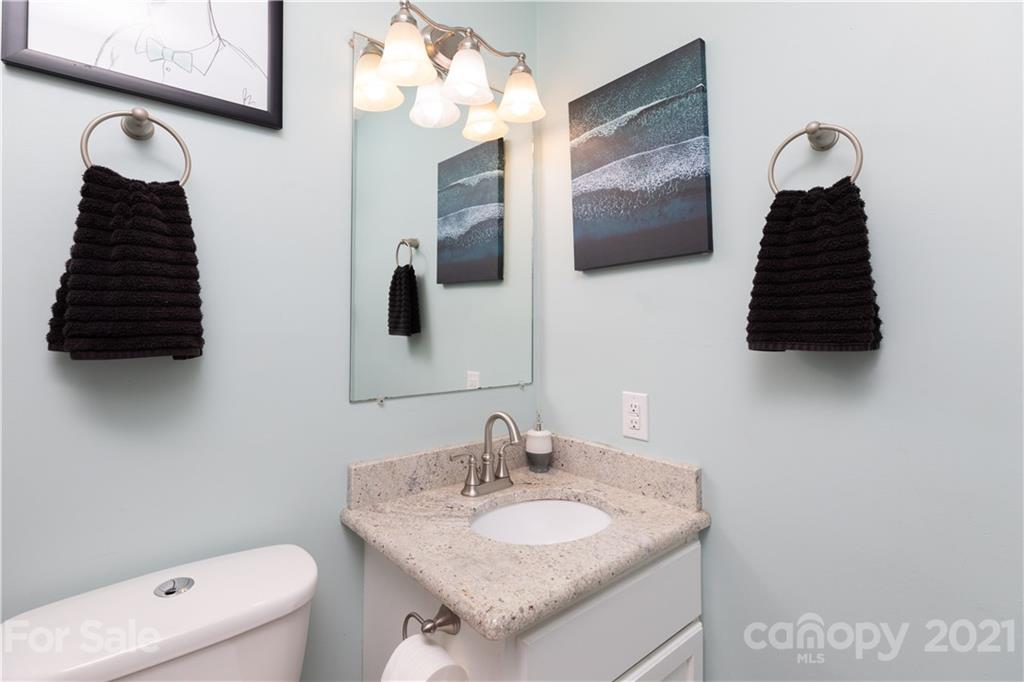 762 State Rd S-46-1086 Clover, SC 29710 - Photo 16 of 34 a bathroom with a sink and a mirror