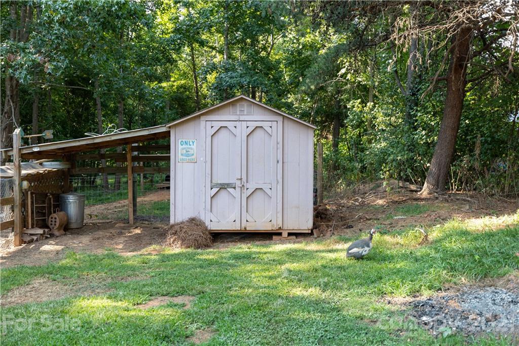 762 State Rd S-46-1086 Clover, SC 29710 - Photo 24 of 34 a view of a house with a yard