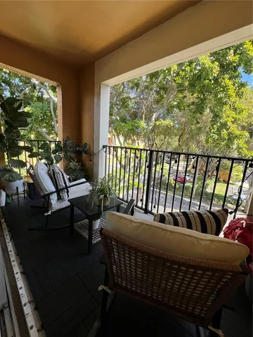 a balcony with chairs