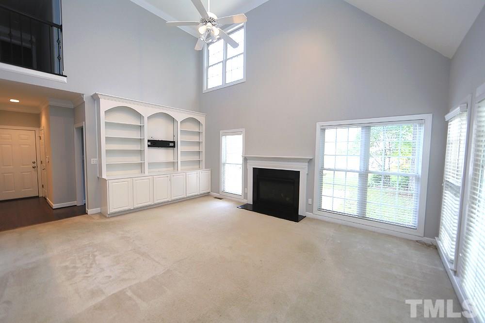 8600 Wapello Lane Raleigh, NC 27613 - Photo 14 of 27 Vaulted ceiling and built-in's.