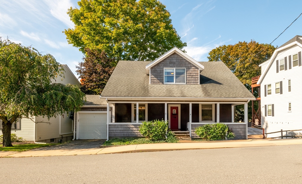 front view of a house with a street