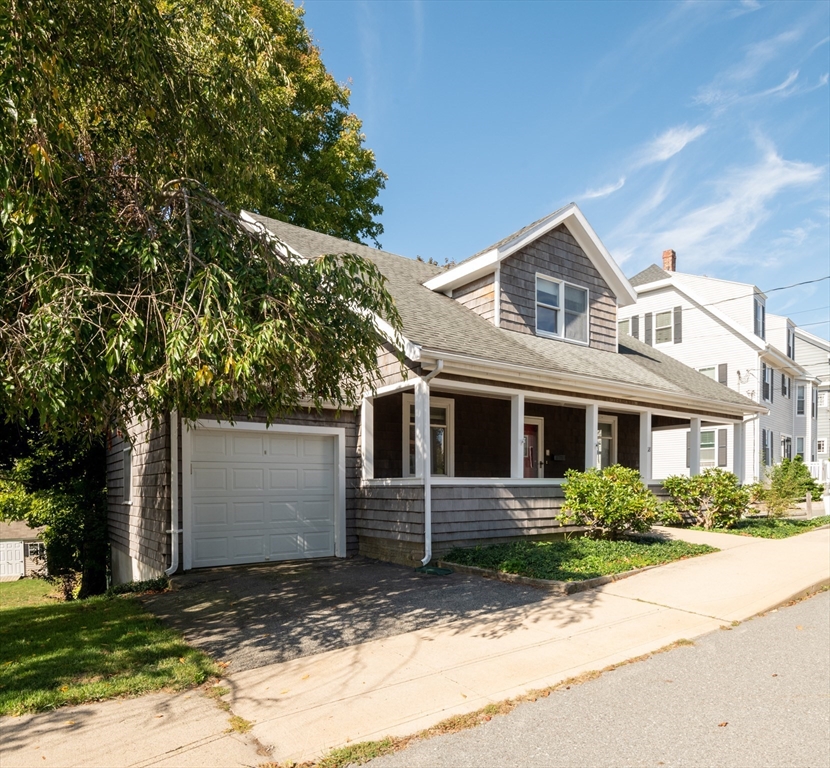 18 Lafayette Road Ipswich, MA 01938 - Photo 2 of 42 a front view of a house with a yard