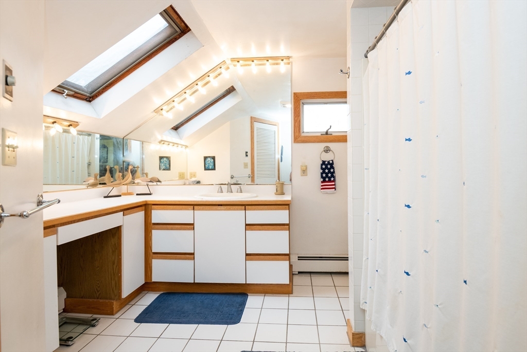 18 Lafayette Road Ipswich, MA 01938 - Photo 21 of 42 a kitchen with stainless steel appliances granite countertop a sink and cabinets