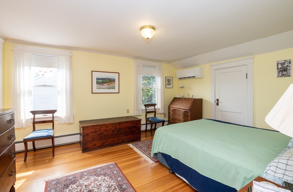 18 Lafayette Road Ipswich, MA 01938 - Photo 28 of 42 a bedroom with a bed and furniture