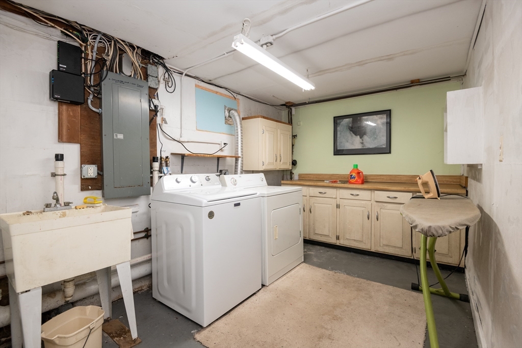 18 Lafayette Road Ipswich, MA 01938 - Photo 32 of 42 a kitchen with a sink appliances and cabinets