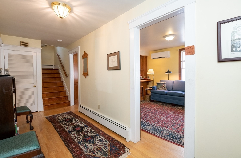 18 Lafayette Road Ipswich, MA 01938 - Photo 7 of 42 a bedroom with furniture and a rug