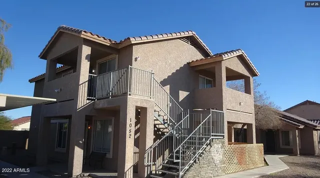 a view of a house with a wooden door