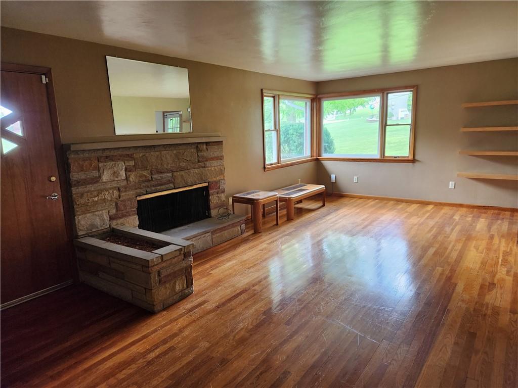 102 September Drive Butler, PA 16002 - Photo 12 of 26 a living room with furniture and a fireplace