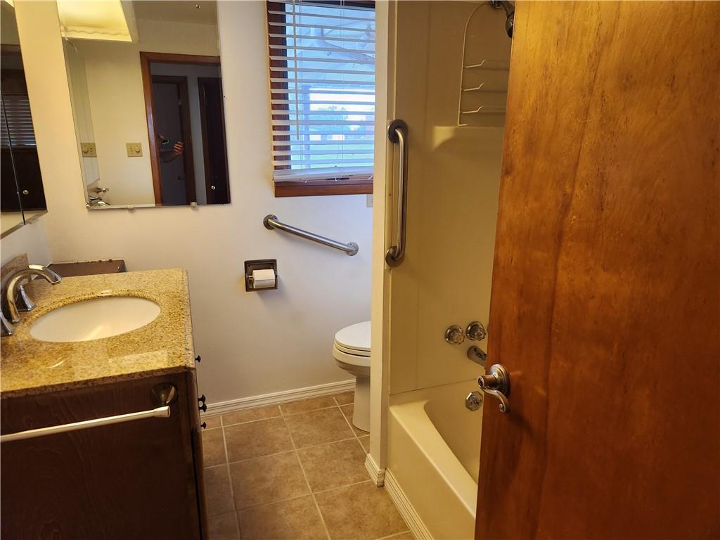 102 September Drive Butler, PA 16002 - Photo 20 of 26 a bathroom with a sink a toilet and shower