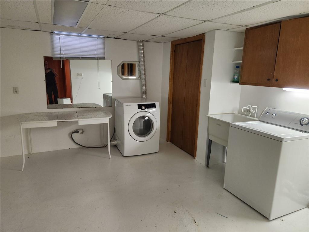 102 September Drive Butler, PA 16002 - Photo 22 of 26 a utility room with dryer and washer