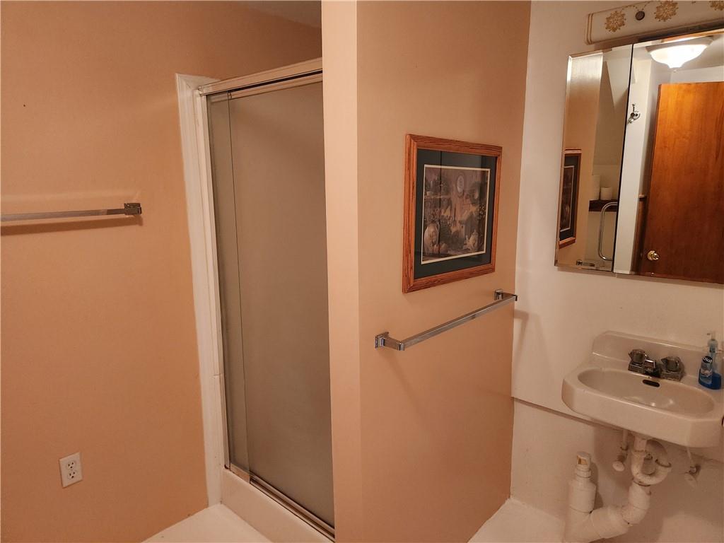 102 September Drive Butler, PA 16002 - Photo 23 of 26 a bathroom with a bathtub and a sink