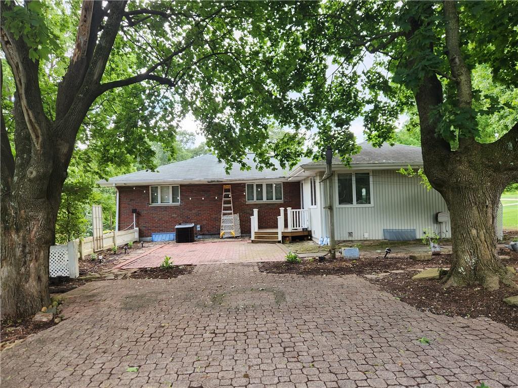102 September Drive Butler, PA 16002 - Photo 3 of 26 a house with trees in the background