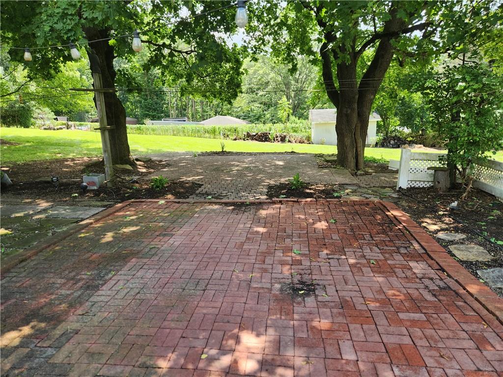 102 September Drive Butler, PA 16002 - Photo 8 of 26 a view of a yard with an trees