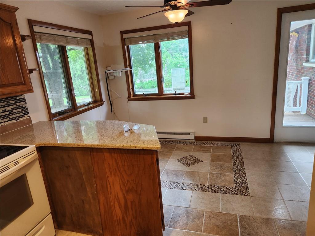 102 September Drive Butler, PA 16002 - Photo 10 of 26 a view of a kitchen with a sink and a window
