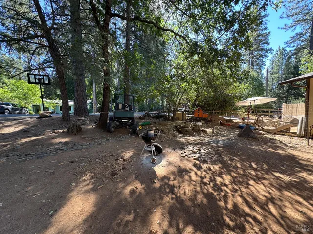 a view of outdoor space with patio furniture and a street