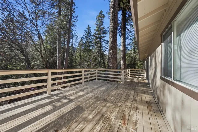 a view of stairs and wooden floor