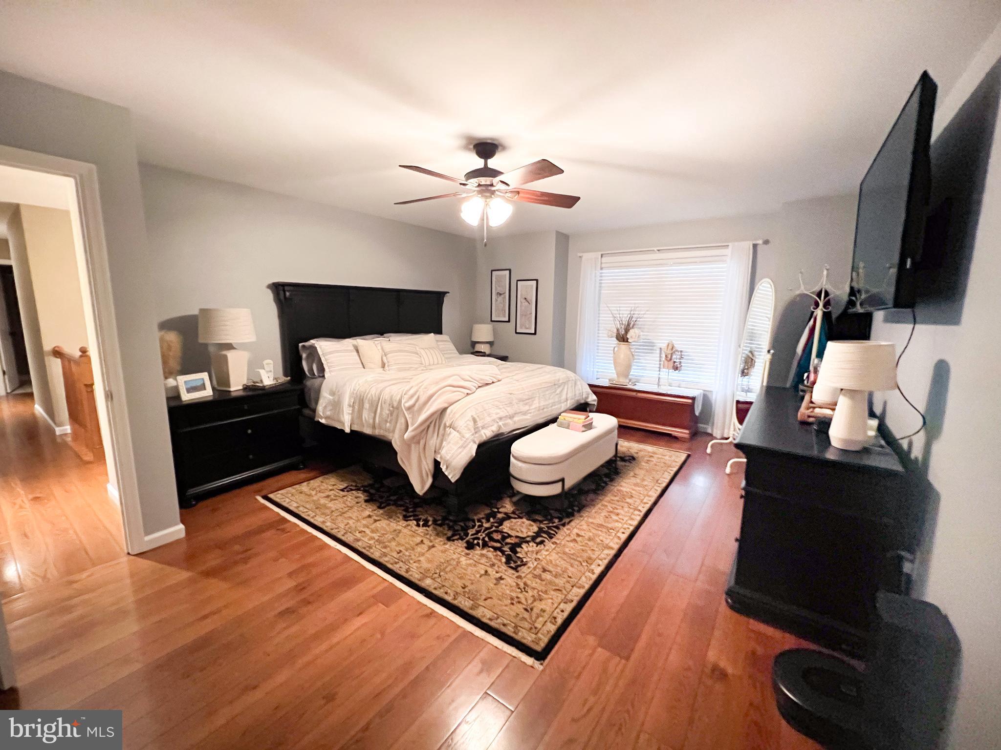 27 Copper Lane Reedsville, PA 17084 - Photo 14 of 45 a bedroom with a bed window and a flat screen tv
