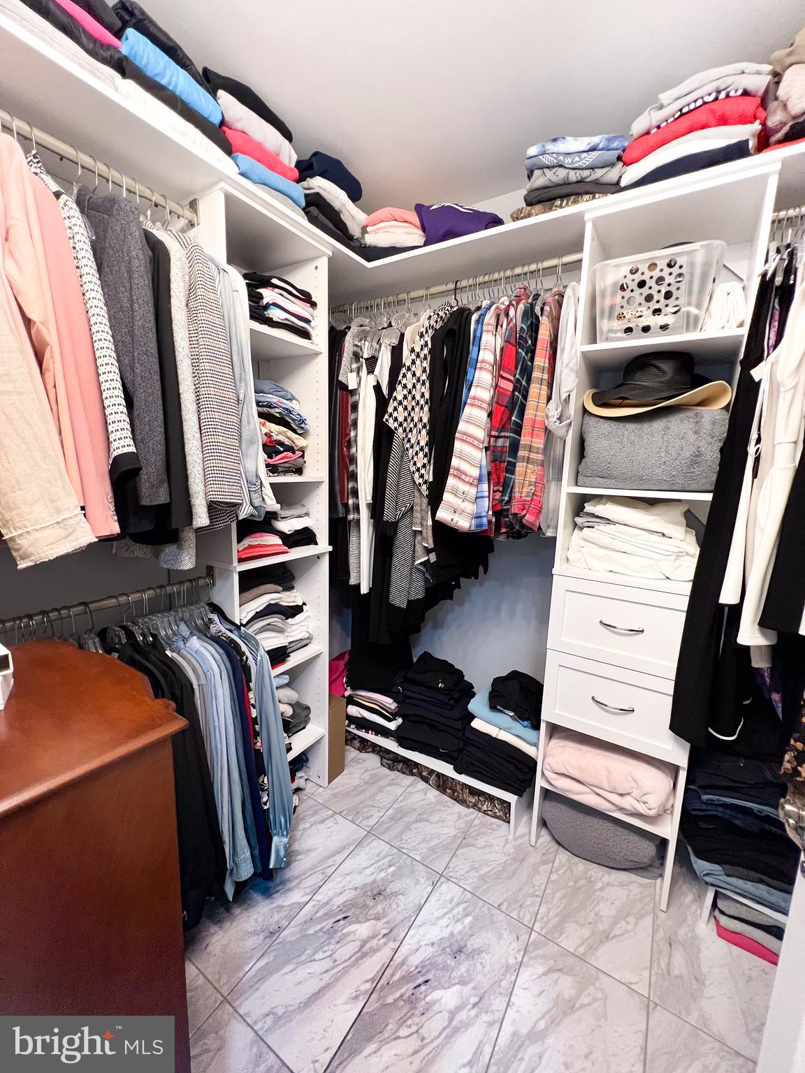 27 Copper Lane Reedsville, PA 17084 - Photo 18 of 45 a view of walk in closet with clothes and shoes
