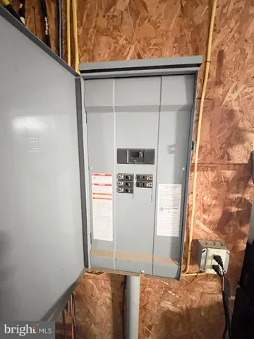 a view of a chairs and table in backyard