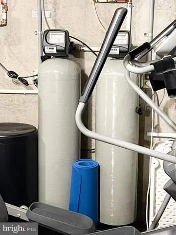 a view of swimming pool with a patio and a backyard of the house