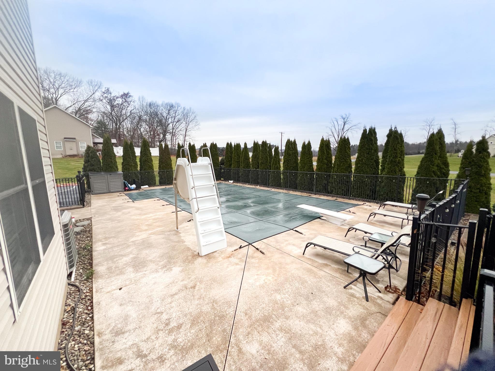 27 Copper Lane Reedsville, PA 17084 - Photo 41 of 45 a view of swimming pool with a patio and a backyard of the house