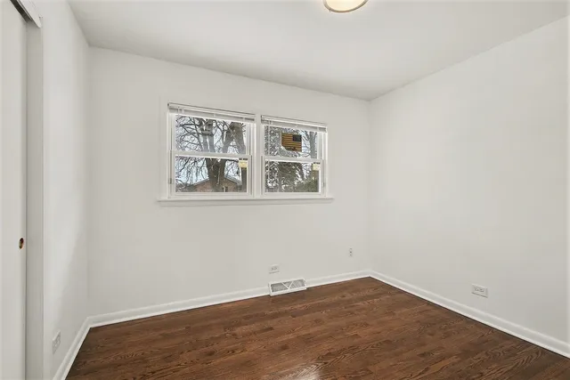 an empty room with a workspace