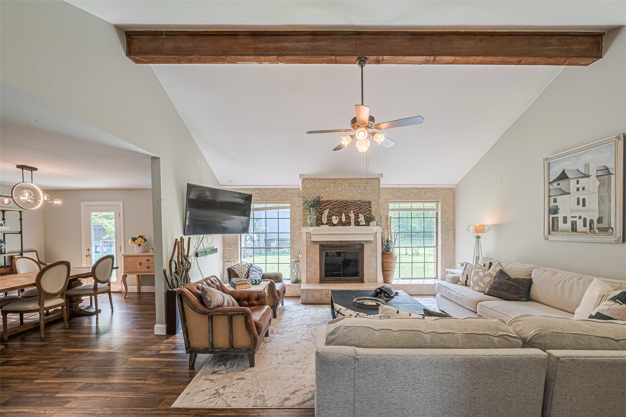 24314 Anderson Street Huffman, TX 77336 - Photo 11 of 48 a living room with furniture and a fireplace