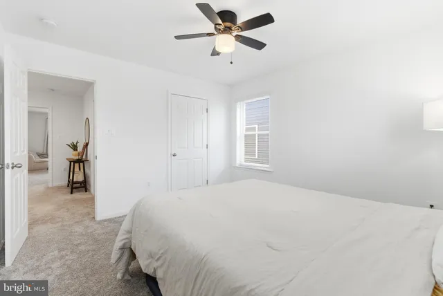 a bedroom with a bed and furniture