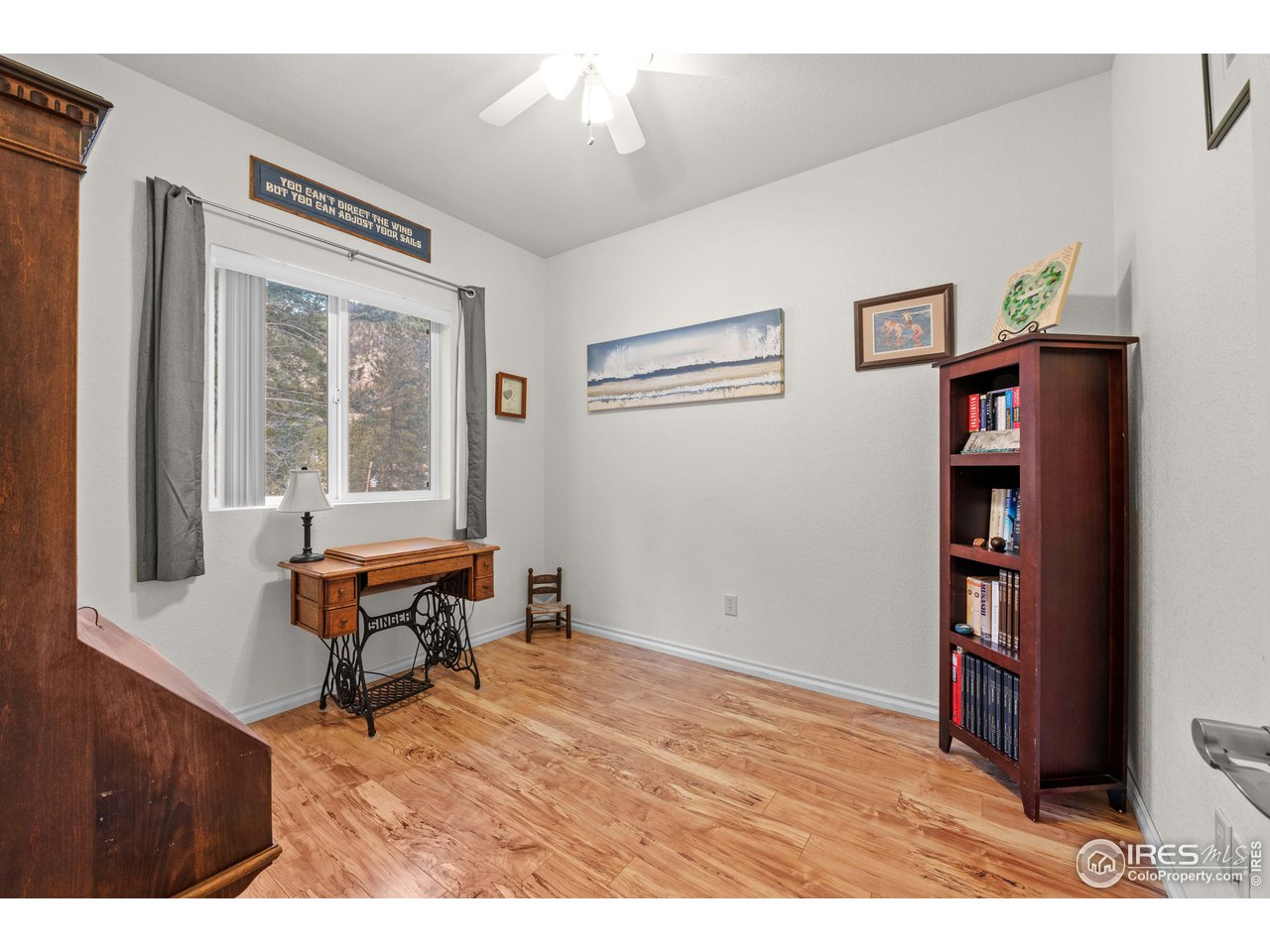 339 Cedar Drive Lyons, CO 80540 - Photo 21 of 37 a room with furniture and a window