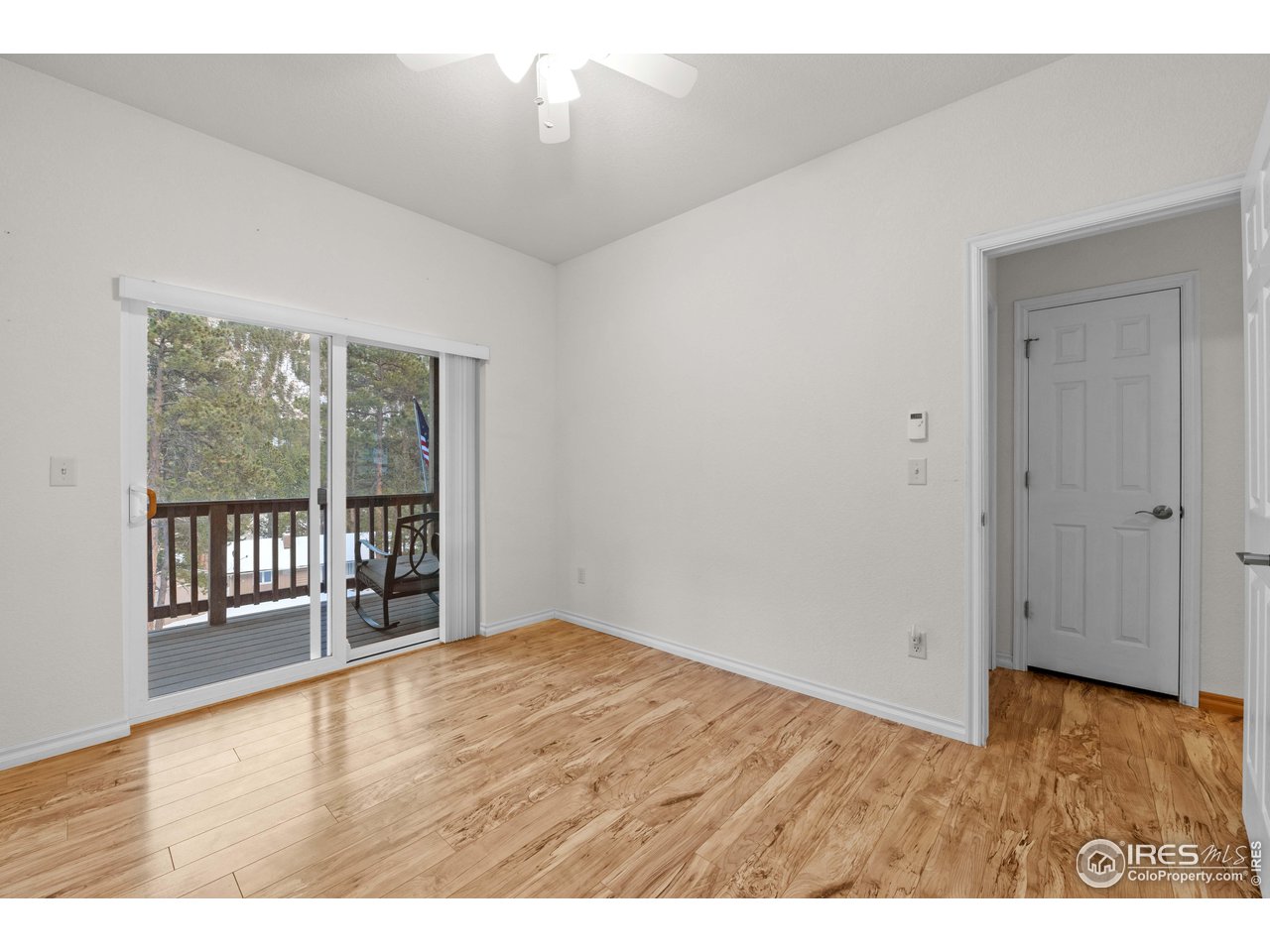 339 Cedar Drive Lyons, CO 80540 - Photo 28 of 37 a view of an empty room with a window
