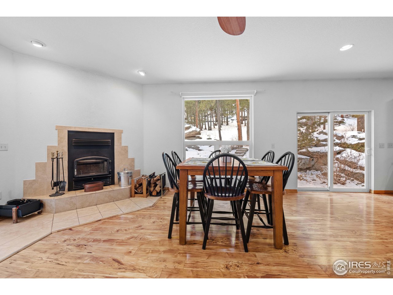339 Cedar Drive Lyons, CO 80540 - Photo 5 of 37 a dining room with furniture and window