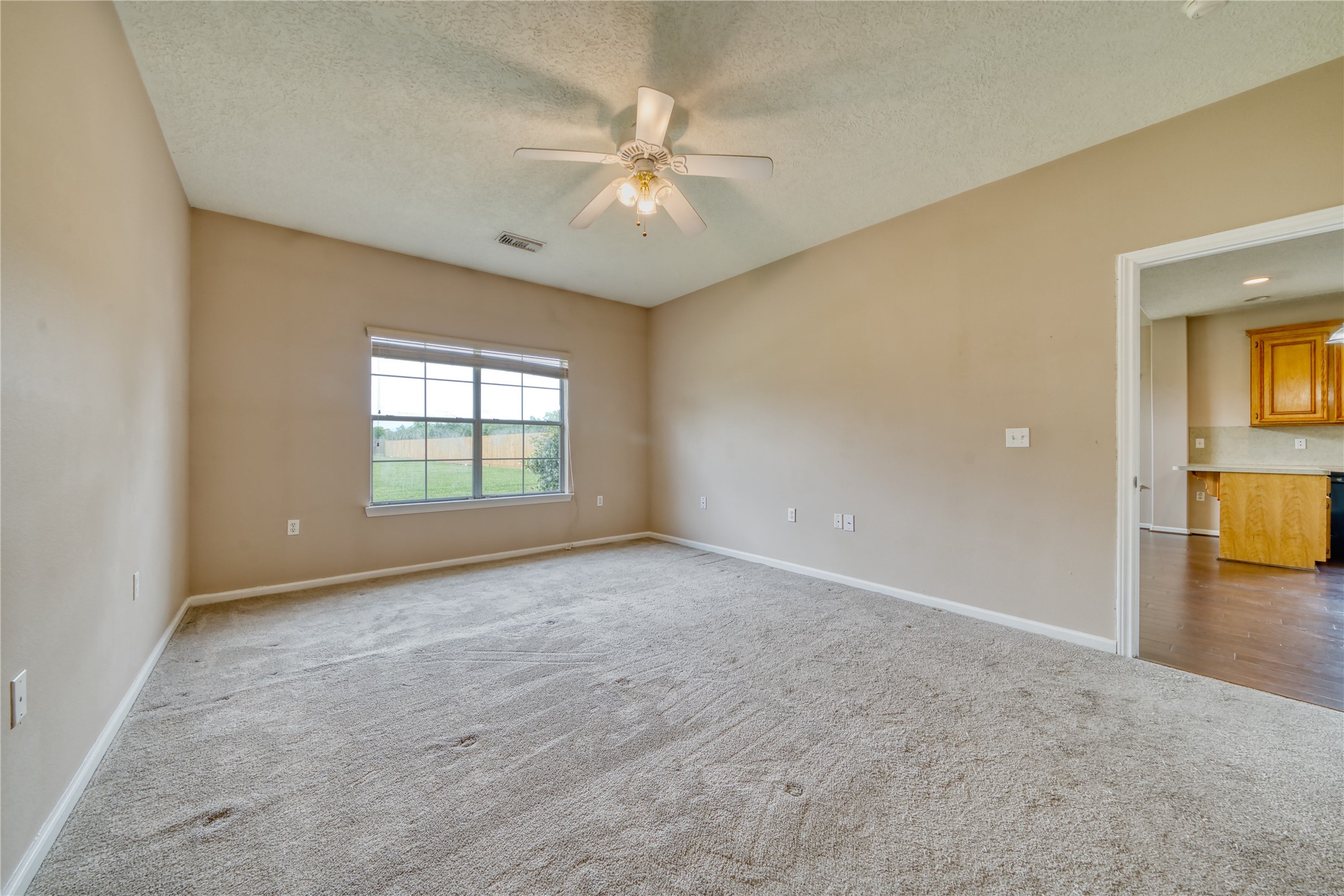 770 Hunt Road, Unit 314 Baytown, TX 77521 - Photo 19 of 26 a view of an empty room with a window