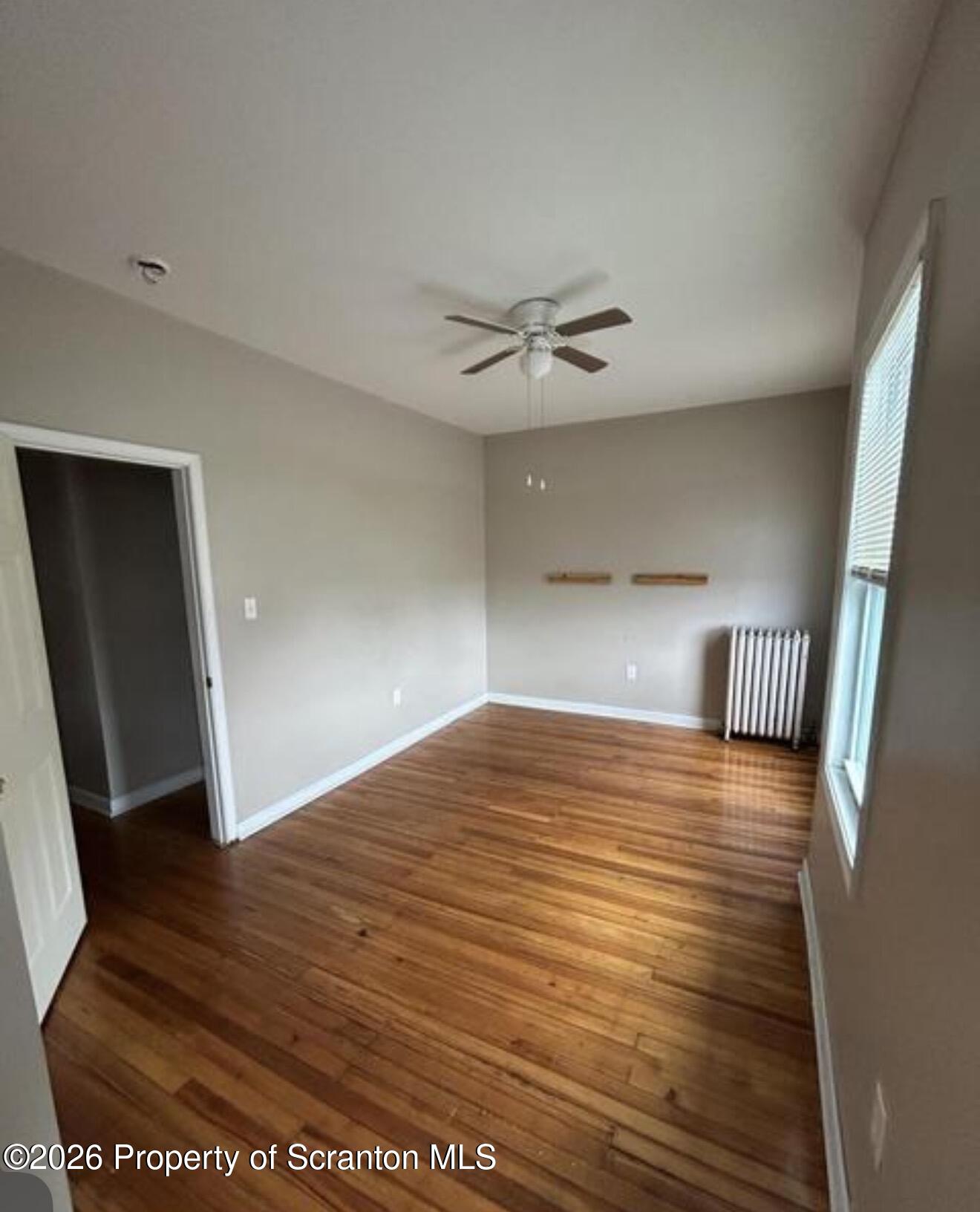 1607 Mulberry Street Scranton, PA 18510 - Photo 2 of 12 a view of empty room with wooden floor