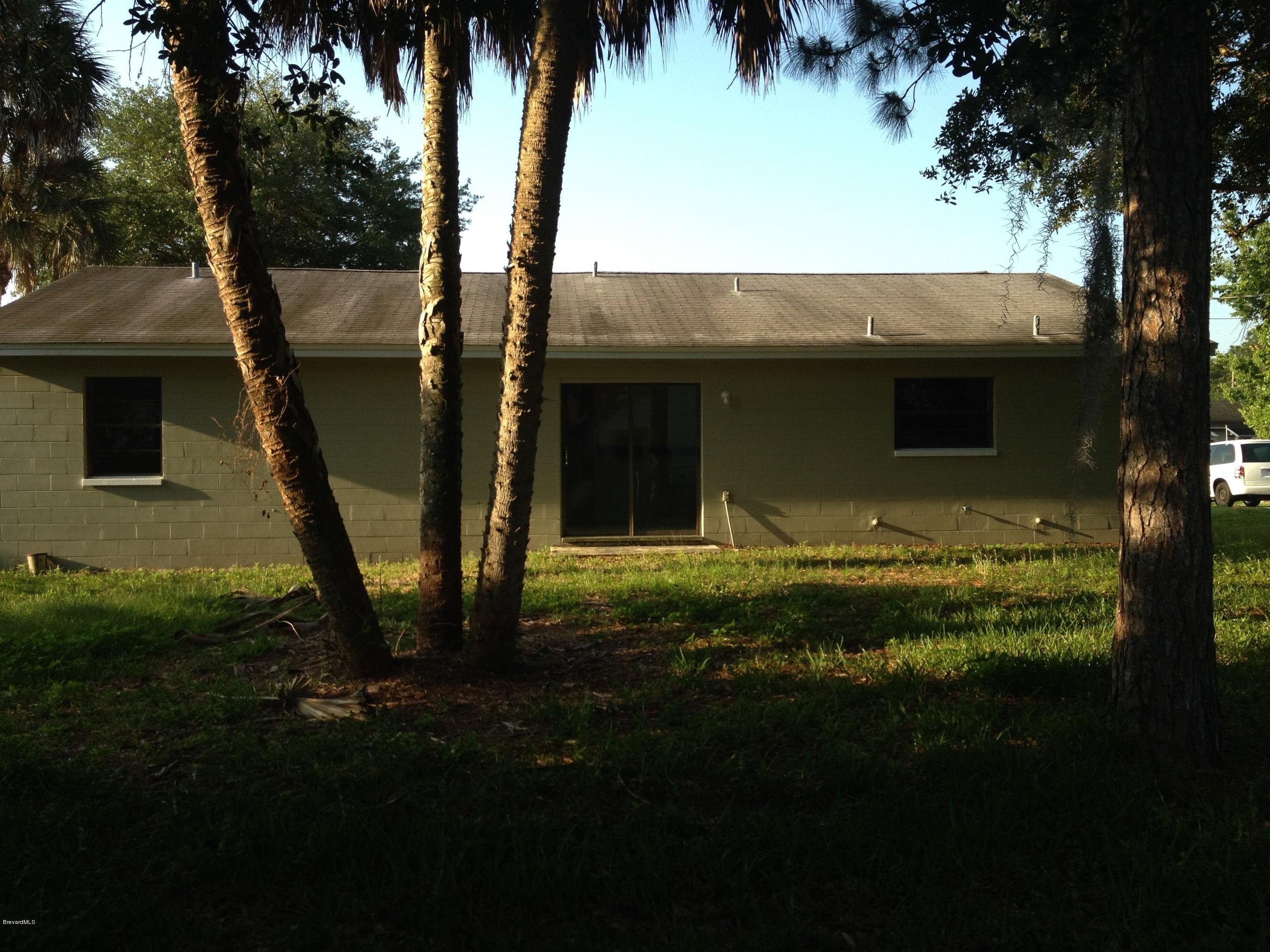 385 Rheine Road Northwest Palm Bay, FL 32907 - Photo 14 of 15 a view of outdoor space and yard
