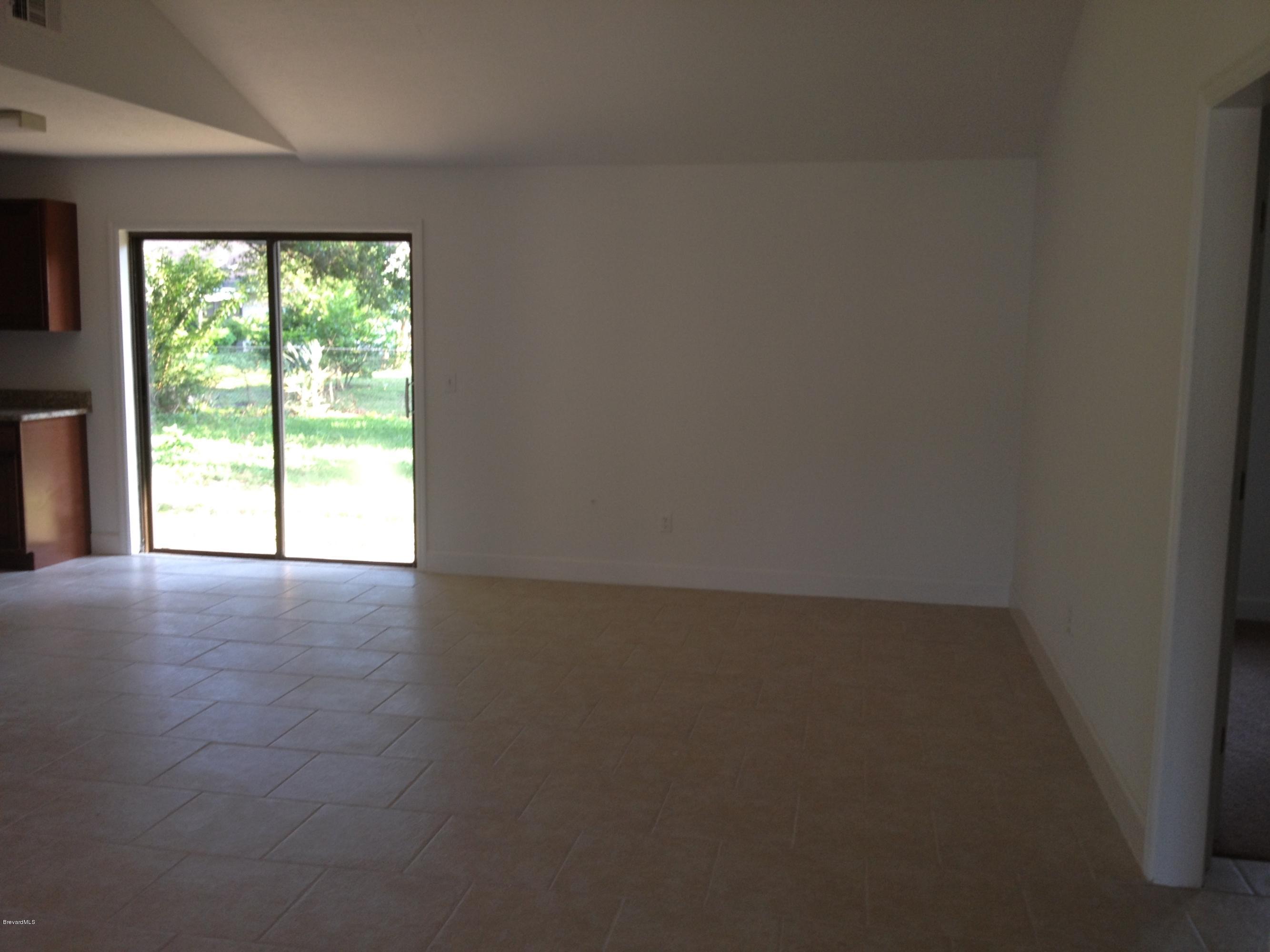 385 Rheine Road Northwest Palm Bay, FL 32907 - Photo 5 of 15 a view of empty room with window