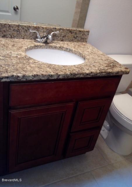385 Rheine Road Northwest Palm Bay, FL 32907 - Photo 9 of 15 a view of a sink and microwave