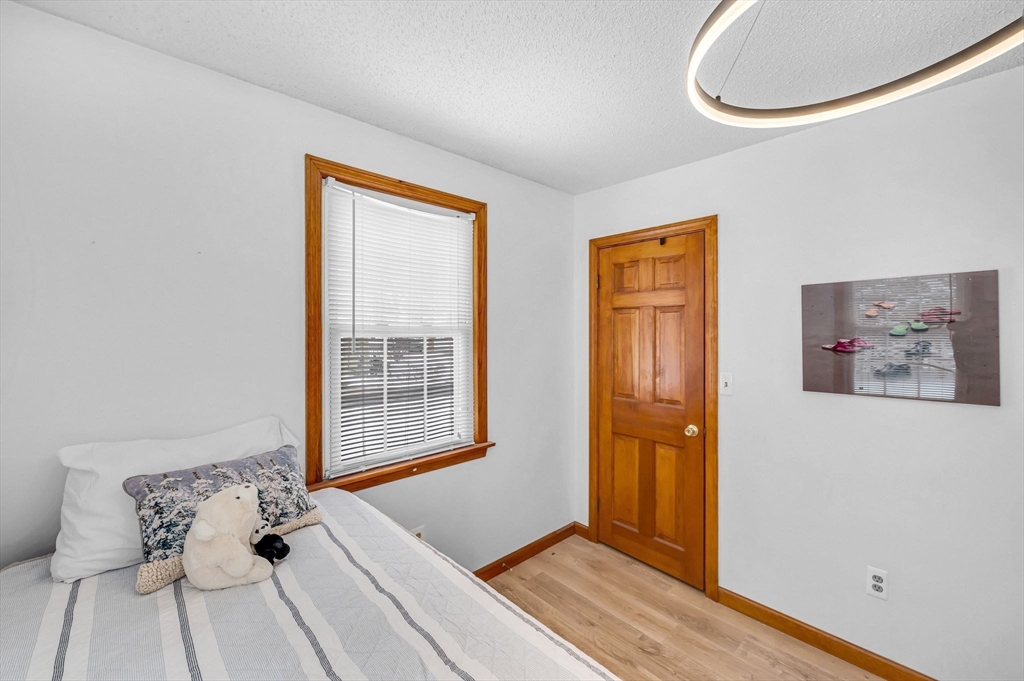 365 Maple Road Longmeadow, MA 01106 - Photo 21 of 32 a view of a room that has a bed and a window