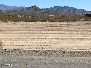 a view of ocean and mountain