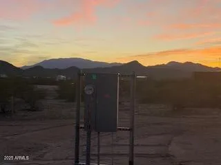 a view of a house with a mountain