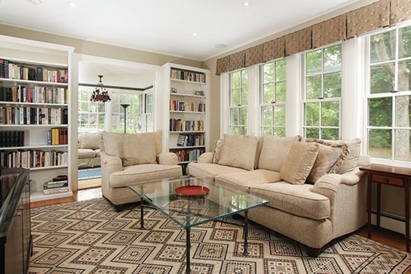 15 Bonad Road Newton, MA 02465 - Photo 3 of 16 a living room with furniture and a book shelf